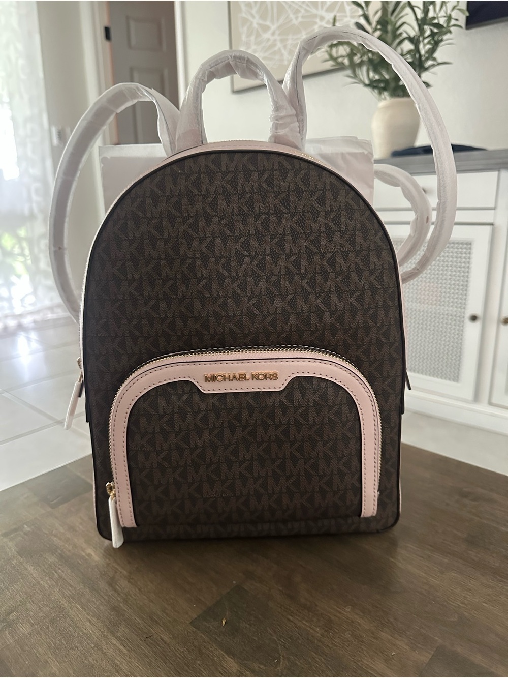 Michael Kors Brown with Light Pink Trim Mini Backpack